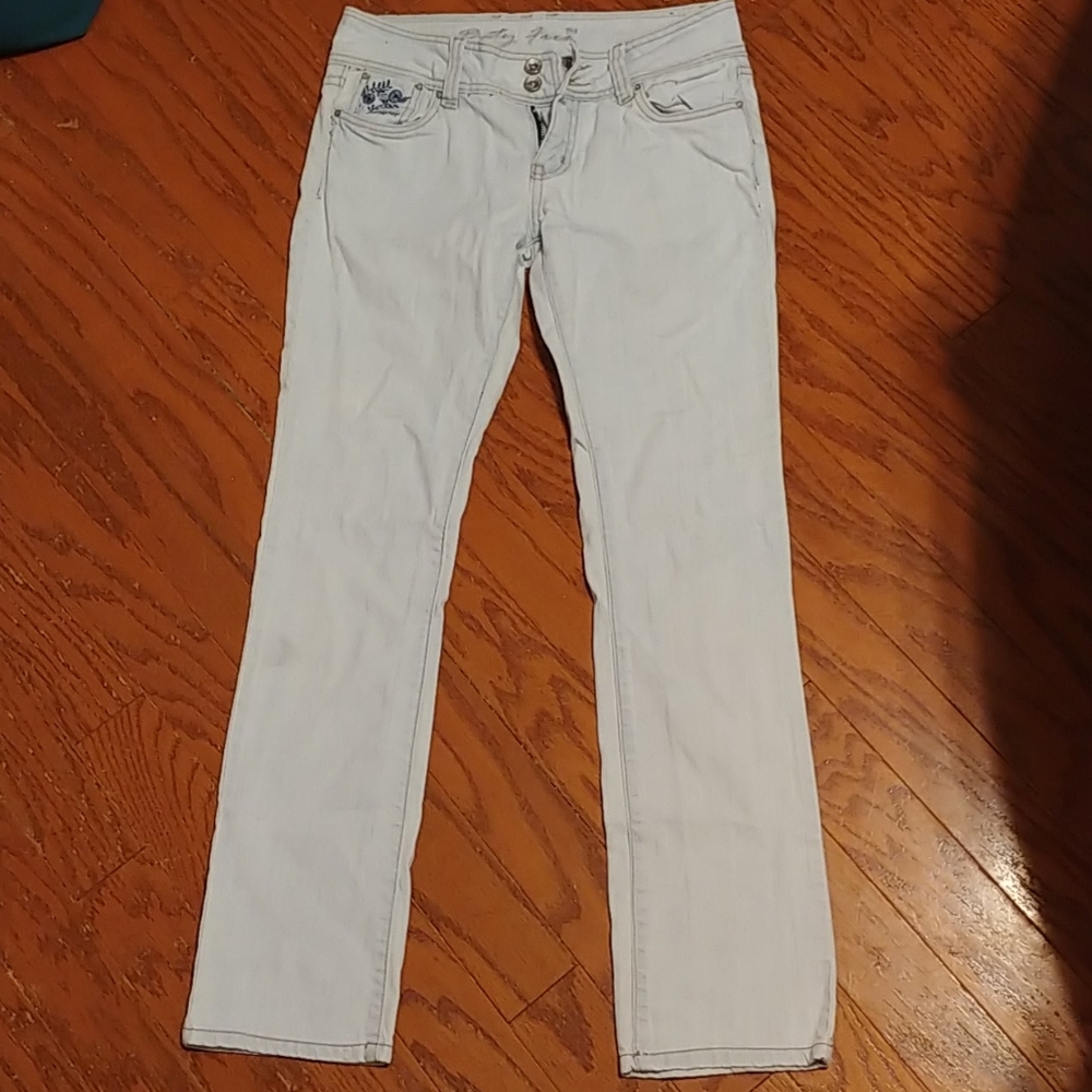 Pale blue jeans with blue floral embroidery